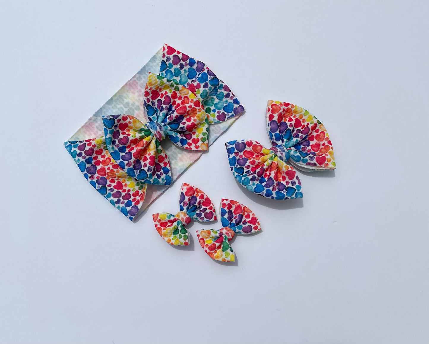Pride bows - Ev's Bowtique Shop, The most comfortable trendy bows for all of your babes. Traditional bows come styled as headwraps, Nylons, clips or pigtail sets! The choice is always yours!