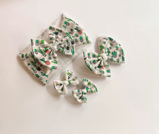 Plant lovers - Ev's Bowtique Shop, The most comfortable trendy bows for all of your babes. Traditional bows come styled as headwraps, Nylons, clips or pigtail sets! The choice is always yours!