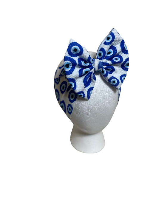 Traditional Bows - Evil eye - Ev's Bowtique Shop The most comfortable trendy bows for all of your babes. Traditional bows come styled as headwraps, Nylons, clips or pigtail sets! The choice is always yours!
